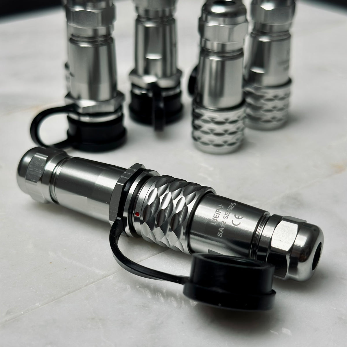 Closeup of WEIPU SF12/SA12 connector in chrome plated brass